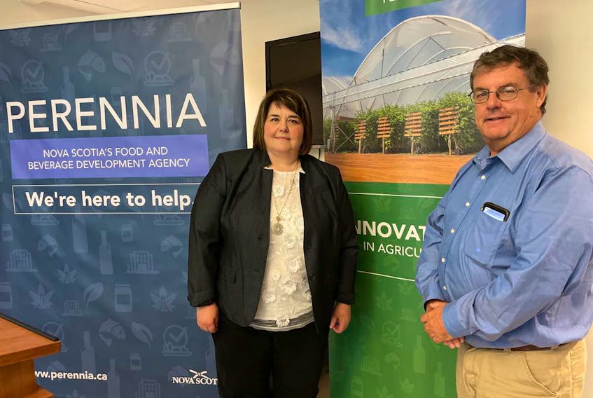 Lynne Godlien, CEO of Perennia Food and Agriculture Corporation (left), and Johnathan Wort, manager of livestock and field crops for Perennia, The province announced on Sept. 19 that $4.4 million dollars would be invested in six different projects throughout the province as a response to climate change. Sarah Jordan