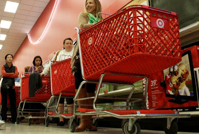 (Reuters) - Target said on Tuesday it will hire nearly 100,000 employees for the holiday season and offer deep discounts starting October, as the U.S. retailer braces for the competitive shopping