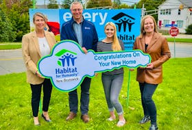 Fredericton Mayor Kate Rogers, left, Habitat N.B. CEO Perry Kendall, newly-selected Habitat homeowner Erin and Social Development Minister Jill Green pose at the site of the soon-to-be constructed duplex on <a tabindex="-1" style="color: rgb(56, 88, 152); cursor: pointer; font-family: inherit;"></a>Albert Street. - Habitat for Humanity New Brunswick Facebook