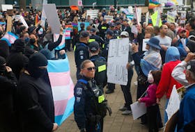 Halifax regional police keep counter-protestors (left) away from those taking part in the 1MillionMarch4Children rally in the Grand Parade in Halifax September 20, 2023.

TIM KROCHAK PHOTO