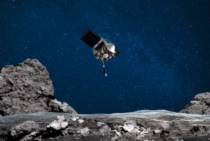 An artist's rendering of the OSIRIS-REx spacecraft descending towards asteroid Bennu to collect a sample of the surface. It's due back on Earth on Sunday.