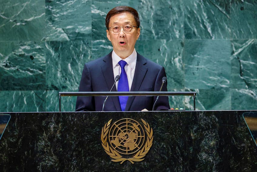 BEIJING (Reuters) - China's Vice President Han Zheng said the country is committed to opening itself wider to the world and will always be a member of the big family of developing countries, Chinese