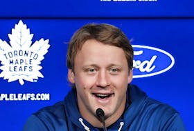 Toronto Maple Leafs defenceman Morgan Rielly speaks to the media during the opening day of their NHL training camp in Toronto, Wednesday, Sept. 20, 2023. 