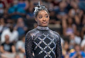 (Reuters) - Simone Biles is set to compete in her sixth world championships this month after posting the top all-around score at a U.S. qualifying competition, USA Gymnastics said on Wednesday. Biles,