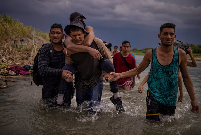 By Daina Beth Solomon and Ted Hesson MEXICO CITY (Reuters) - U.S. border authorities encountered more than 142,000 migrants at the U.S.-Mexico border in the first half of September, according to data