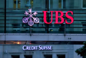 HONG KONG (Reuters) - UBS has cut around 70% of the Hong Kong-based staff headcount at Credit Suisse's securities research unit, two sources with direct knowledge of the matter said, as the two Swiss