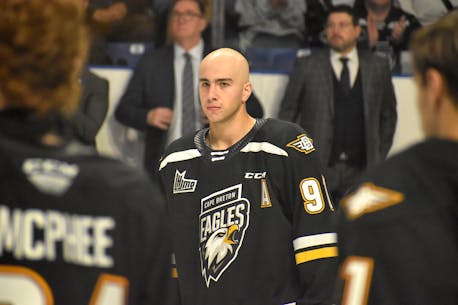 IN PHOTOS: Cape Breton Eagles’ Jacob Newcombe participates in warmup, pre-game ceremony prior to team’s home opener on Friday