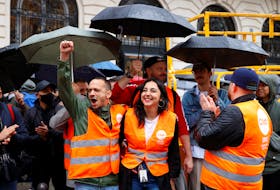 By Manuel Ausloos and Louise Dalmasso PARIS (Reuters) - Workers at Apple stores in France began a nationwide strike over pay and working conditions on Friday in a protest designed to coincide with the