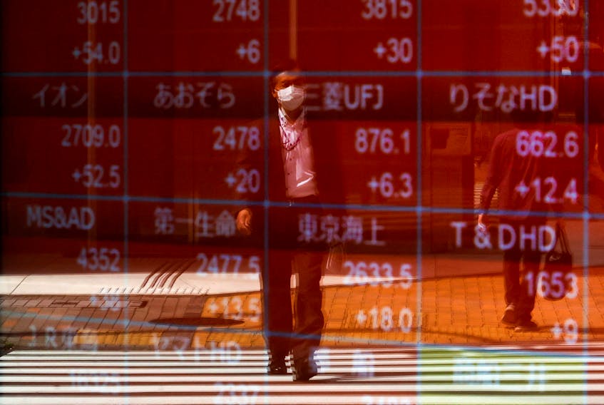 By Tom Westbrook SINGAPORE (Reuters) - Stocks and bonds were under pressure on Friday as investors hunkered down for U.S. interest rates to stay higher for longer, while waiting to see whether the