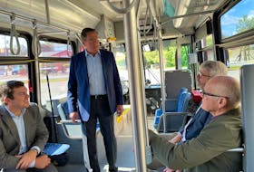 Dwight Whynot, acting general manager of Kings Transit, speaks with politicians after an $11.9-million project was announced to modernize the fleet. From left are Kings-Hants MP Kody Blois, Whynot, Kings North MLA John Lohr and County of Kings Mayor Peter Muttart.
Jason Malloy