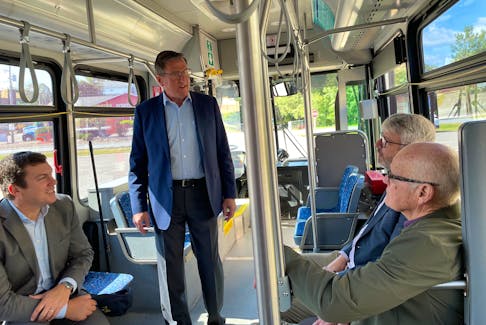 Dwight Whynot, acting general manager of Kings Transit, speaks with politicians after an $11.9-million project was announced to modernize the fleet. From left are Kings-Hants MP Kody Blois, Whynot, Kings North MLA John Lohr and County of Kings Mayor Peter Muttart.
Jason Malloy