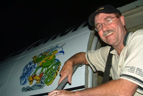 Jim Abraham boarding the Convair 580 research plane.
