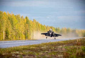 OSLO (Reuters) - A pair of F-35A Lockheed Martin fighter jets have landed on a motorway for the first time, footage from the Norwegian military showed, a step that enables them to reduce vulnerable