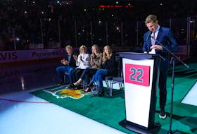 Nathan MacKinnon, right, is joined on the ice by his parents, sister and girlfriend for his Halifax Mooseheads jersey retirement at the Scotiabank Centre on Friday. - Halifax Mooseheads