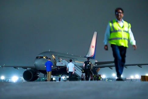 Prime Minister Justin Trudeau's plane is seen on the tarmac after being grounded due to a technical issue following the G20 Summit in New Delhi, India. 