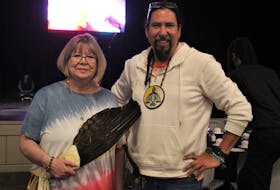 Yvonne Meunier-Paul, left, did the opening prayer before the National Indigenous Peoples Day feast at Membertou Trade and Convention Centre.  Her son Jeff Ward, right,  was the guest speaker. NICOLE SULLIVAN/CAPE BRETON POST