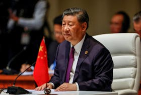 BEIJING (Reuters) - China is willing to work with South Korea to promote a strategic partnership to develop with the times, President Xi Jinping told South Korean Prime Minister Han Duck-soo on