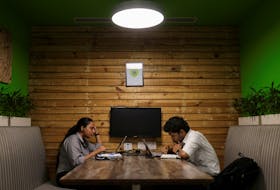 By Munsif Vengattil and Shivangi Acharya NEW DELHI (Reuters) - India will defer an import licence requirement for laptops and tablets, two government officials said, a policy U-turn after industry and