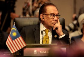 KUALA LUMPUR (Reuters) - Malaysia Prime Minister Anwar Ibrahim said China had given an assurance that it would continue to negotiate with Southeast Asian countries over disputed territorial claims in