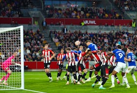 By Alan Baldwin LONDON (Reuters) - Everton celebrated a breakthrough first victory of the Premier League season at Brentford on Saturday with James Tarkowski scoring against his former club in a