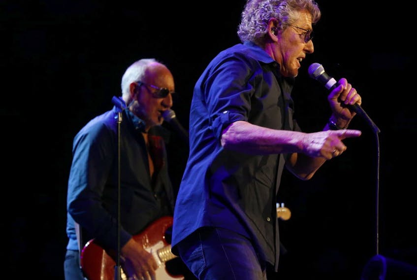  Lead singer Roger Daltrey and Pete Townshend kick into The Seeker their second song of the night on The Who Hits 50! tour at the ACC in Toronto, Ont. on Tuesday, March 1, 2016. (Jack Boland/Toronto Sun/Postmedia Network)