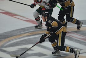 Charlottetown Islanders forward Ross Campbell, 15, carries the puck through the neutral zone against the Halifax Mooseheads at Eastlink Centre in Charlottetown on Sept. 23. Campbell is from Souris. Jason Simmonds • The Guardian