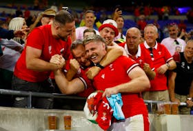 LYON, France (Reuters) - Wales dramatically lifted their performance levels to record a one-sided win over Australia and book a quarter-final berth at the Rugby World Cup, to the delight of their