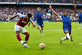 By Clare Lovell LONDON (Reuters) - A 73rd-minute strike by Ollie Watkins earned Aston Villa all three points at goal-starved, 10-man Chelsea in the Premier League on Sunday. Watkins tore through the