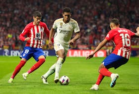 By Fernando Kallas MADRID (Reuters) - Alvaro Morata scored a brace to help Atletico Madrid deliver a statement performance as they outclassed city rivals Real Madrid in a 3-1 derby win on Sunday.