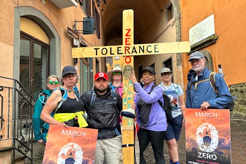 St. John's activist and clergy abuse survivor Gemma Hickey (centre, with red cap) poses in Italy with fellow survivors and allies joining them on a pilgrimage from Montefiascone to St. Peter's Square, as they call on the Vatican to implement a zero-tolerence law for sexual abuse by church officials.
