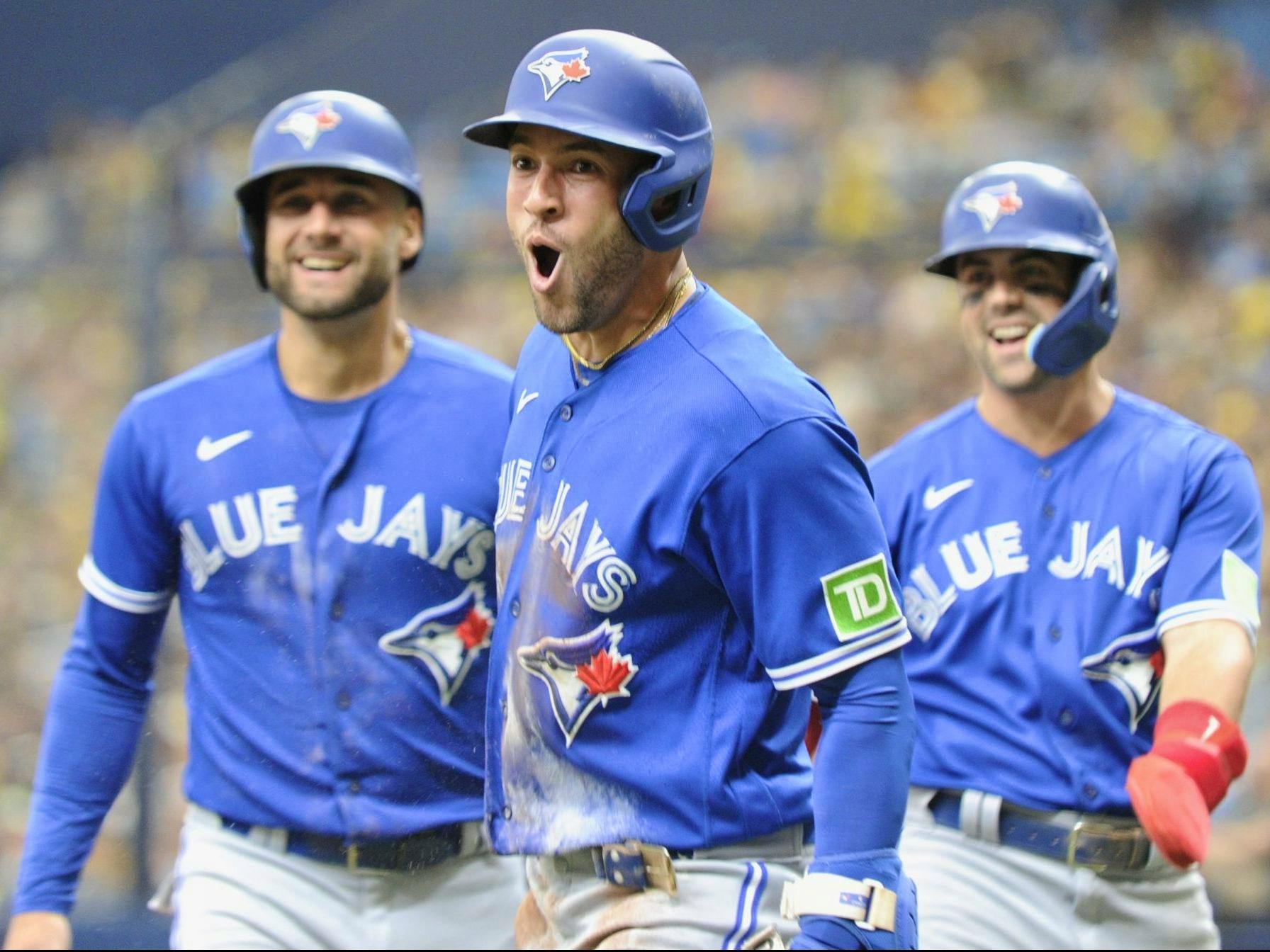 George Springer of Toronto Blue Jays celebrates his home run