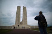  File photo: Visitors walk toward the Canadian National Vimy Memorial in Vimy, France.