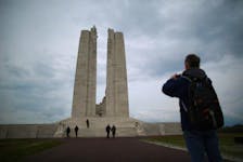  File photo: Visitors walk toward the Canadian National Vimy Memorial in Vimy, France.