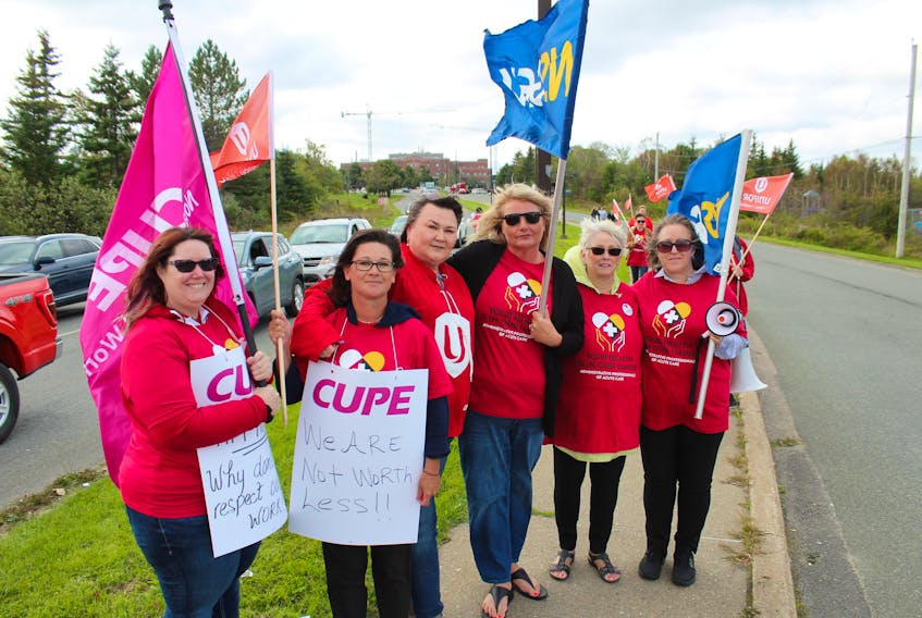 Among those on hand for Monday’s information picket at the Cape Breton Regional Hospital were workers, from left, Camie Rouleau and Maureen Dunn along with union leaders Sue Gill, Unifor, Tracey Groves, NSGEU, Kathy MacLeod, CUPE, and Kim Sheppard, NSGEU. CAPE BRETON POST STAFF