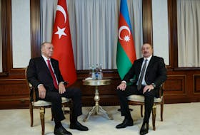 By Andrew Osborn and Nailia Bagirova (Reuters) - Azerbaijani President Ilham Aliyev hosted talks on Monday with his Turkish counterpart Tayyip Erdogan at which he hinted at the prospect of creating a