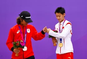 By Martin Quin Pollard and Ian Ransom HANGZHOU, China (Reuters) -India won their first golds and North Koreans stirred up drama by snubbing their South Korean rivals on the podium on day two of the