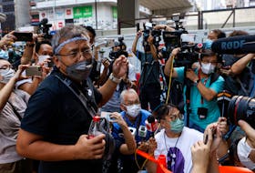 By Jessie Pang HONG KONG (Reuters) - The head of Hong Kong's leading journalists group was sentenced on Monday to five days jail for obstructing police officers in September last year after a case