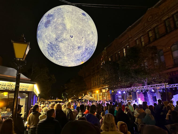 The Moonlight Bazaar took place on Saturday evening, September 23rd, on Victoria Row in Charlottetown. The event, originally from New Brunswick, is a street festival that brings together music, food, art, and live performances under the light of a giant inflatable moon. Thinh Nguyen • The Guardian