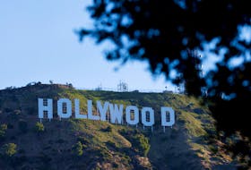 LOS ANGELES (Reuters) - Hollywood writers reached a tentative labor agreement with major studios on Sunday, the Writers Guild of America said, a deal expected to end one of two strikes that have