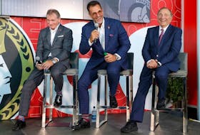 Cyril Leeder, Ottawa Senators President, Sens owner Michael Andlauer and NHL commissioner Gary Bettman attending Friday's announcement.