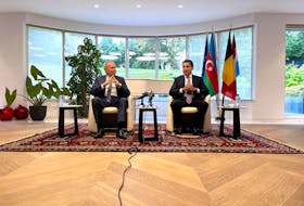 By Andrew Gray BRUSSELS (Reuters) - Azerbaijan has no intention of taking military action to create a land corridor in southern Armenia, the foreign policy adviser to Azerbaijan's president said on