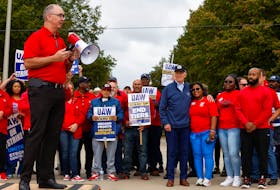 Belleville, Michigan (Reuters) - U.S. President Joe Biden said United Auto Workers should get the 40% pay raise the union is seeking as he joined the auto workers on strike in Michigan on Tuesday.
