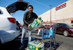 (Reuters) - Costco Wholesale topped Wall Street's estimates for quarterly sales on Tuesday as consumers flocked to its stores for cheaper groceries and other necessities, helping offset feeble demand