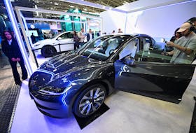 (Reuters) - Tesla and European carmakers that export from China to the EU will be part of the bloc's probe into whether the country's electric vehicles industry is receiving unfair subsidies, the