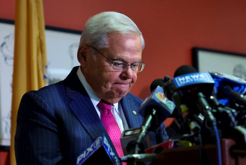 WASHINGTON (Reuters) - U.S. Democratic Senators Tammy Baldwin and Jon Tester joined a growing number of Democrats on Tuesday when they called for Senator Bob Menendez to resign, after prosecutors