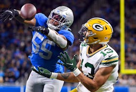 Allen Lazard of the Green Bay Packers catches a touchdown pass during the second quarter against the Detroit Lions last season.