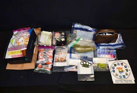 Police in Bathurst executed a search warrant at a home in the city on Sept. 22 and seized 1,595 various suspected prescription pills, 3.23 grams of magic mushrooms, 55.68 grams of cannabis, 4.54 grams of suspected crystal methamphetamine, contraband cigarettes, brass knuckles, unused syringes and drug preparation kits, zip lock bags and score sheets.
