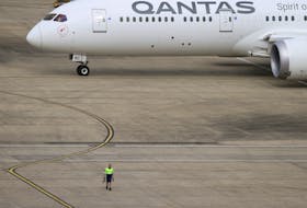 SYDNEY (Reuters) - The chairman of Australia's Qantas Airways on Wednesday vowed to stay in his role despite a host of scandals engulfing the airline, saying its biggest shareholders wanted leadership