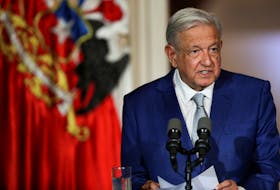 MEXICO CITY (Reuters) - Mexican President Andres Manuel Lopez Obrador on Wednesday called for a meeting of foreign ministers from 10 countries around Latin America to discuss migration, as record