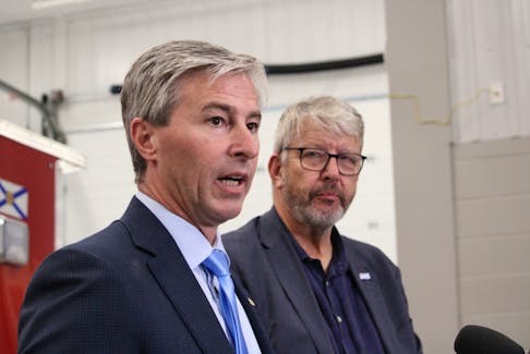 Nova Scotia Premier Tim Houston, left, and John Lohr, the minister responsible for the Office of Emergency Management and Kings North MLA, announce nearly $1.5 million for 80 organizations Sept. 19 in Canning. The funding is coming from the Emergency Services Provider Fund.
